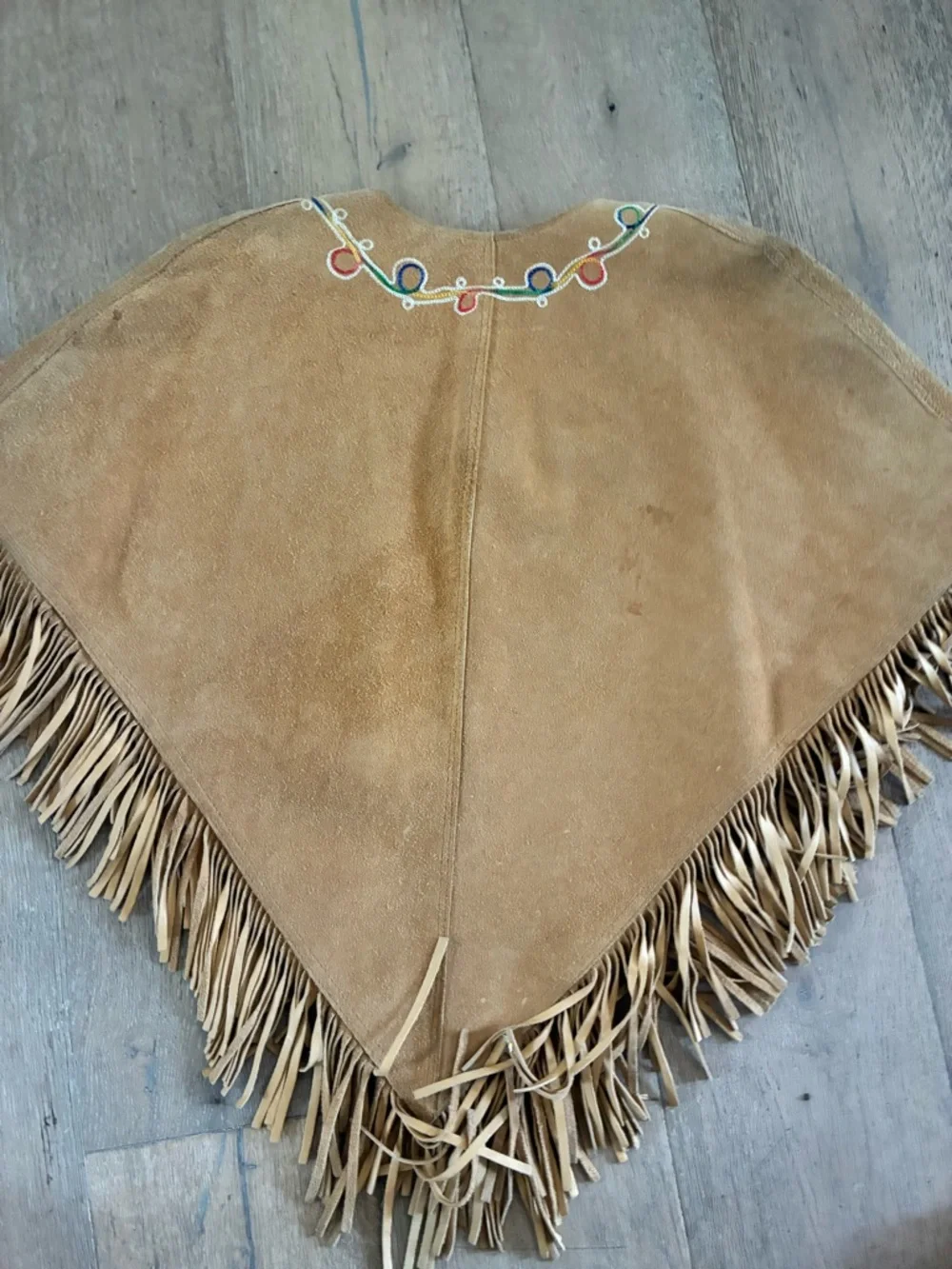 Fringed Suede Embroidered Poncho in Tan